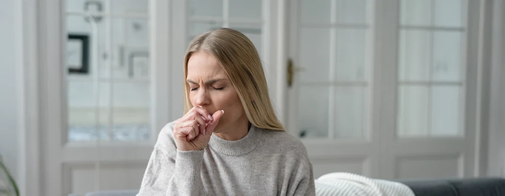 A-woman-coughing-due-to-pneumonia-symptoms (1)
