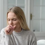 A-woman-coughing-due-to-pneumonia-symptoms (1)